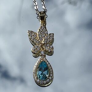 Faceted Blue Topaz and CZ 14K Gold over 925 Sterling Silver Pendant